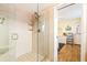 Modern shower featuring glass enclosure, tiled walls, and a comfortable design for a refreshing experience at 5900 Shore S Blvd # 512, Gulfport, FL 33707
