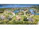 Breathtaking aerial view of waterfront homes in a lushly landscaped community with expansive waterways at 6120 9Th Avenue Ne Cir, Bradenton, FL 34212
