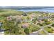 Aerial view of the community with waterfront canal access and lush natural mangroves surrounding the homes at 6120 9Th Avenue Ne Cir, Bradenton, FL 34212