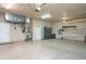 Spacious garage featuring storage cabinets and ample parking space at 6120 9Th Avenue Ne Cir, Bradenton, FL 34212