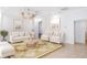 Bright and airy living room with comfortable seating and elegant decor, creating a relaxing ambiance at 6120 9Th Avenue Ne Cir, Bradenton, FL 34212