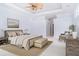 Spacious main bedroom with carpet, an area rug, and decorative furnishings at 6120 9Th Avenue Ne Cir, Bradenton, FL 34212