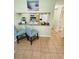 Bright kitchen area with breakfast bar, modern appliances, and an open layout, perfect for casual dining and entertaining at 6931 Stones Throw N Cir # 5210, St Petersburg, FL 33710