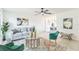 Bright living room with modern decor, comfortable seating, and stylish accents with tile flooring at 717 Fairmont Dr, Brandon, FL 33511