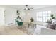 Comfortable living room with large window, stylish rug, and tile floors, providing a relaxing atmosphere at 717 Fairmont Dr, Brandon, FL 33511