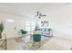 Inviting living room with a large window, comfortable seating, rug, and tile floors at 717 Fairmont Dr, Brandon, FL 33511