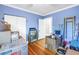 Cluttered bedroom currently used for storage with boxes and personal items at 7427 4Th N Ave, St Petersburg, FL 33710