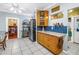 Bright eat-in kitchen with stainless steel appliances and adjacent dining area, perfect for Gathering meals and entertaining at 7427 4Th N Ave, St Petersburg, FL 33710