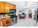 Functional kitchen with stainless appliances adjacent to a cozy dining area at 7427 4Th N Ave, St Petersburg, FL 33710