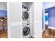 Convenient laundry closet with stacked washer and dryer units maximizes space and functionality at 7427 4Th N Ave, St Petersburg, FL 33710