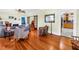 Bright living room with hardwood floors, fireplace, and access to other rooms through glass doors at 7427 4Th N Ave, St Petersburg, FL 33710