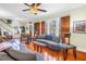 Inviting living room features hardwood floors, comfortable seating, and natural light at 7427 4Th N Ave, St Petersburg, FL 33710