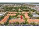 Aerial view of the Beachway Condominiums community with lush landscaping and beautiful buildings at 10764 70Th Ave # 6210, Seminole, FL 33772