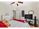 Bedroom featuring furnishings and a closet with folding door at 10764 70Th Ave # 6210, Seminole, FL 33772