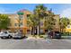 Three-story building featuring a blend of architectural styles, balconies, and convenient parking, set among lush greenery at 10764 70Th Ave # 6210, Seminole, FL 33772