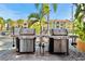 Outdoor community grills with stainless steel finish in an outdoor area perfect for residents to enjoy cookouts at 10764 70Th Ave # 6210, Seminole, FL 33772