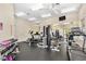 Community gym with modern equipment including treadmills, weight machines, and free weights for residents' fitness needs at 10764 70Th Ave # 6210, Seminole, FL 33772