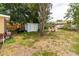 View of backyard and shed, great potential for outdoor activities or storage at 1144 7Th Nw St, Largo, FL 33770