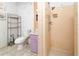A full bathroom featuring tile walls, vanity, toilet, and walk in shower at 1144 7Th Nw St, Largo, FL 33770