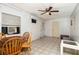 Bright dining room with tile floors, AC unit and lots of natural light at 1144 7Th Nw St, Largo, FL 33770