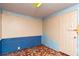 Inside view of room with a tiled floor and block wall, providing a durable and unique design element at 1144 7Th Nw St, Largo, FL 33770