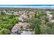 Lovely aerial view of a home in a residential area, close to local amenities with beautifully landscaped surroundings at 120 Colony South Dr, Tarpon Springs, FL 34689