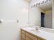 Bathroom featuring a single vanity and a large mirror at 120 Colony South Dr, Tarpon Springs, FL 34689