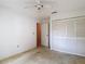 Bedroom featuring a large closet for ample storage, providing a tidy and organized space at 120 Colony South Dr, Tarpon Springs, FL 34689