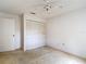 Spacious bedroom with a large closet, offering ample storage and organization at 120 Colony South Dr, Tarpon Springs, FL 34689