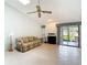 Bright living room features neutral wall and floor finishes at 120 Colony South Dr, Tarpon Springs, FL 34689