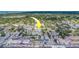 An aerial view of the multi-Gathering property showcasing its proximity to nearby streets and buildings at 1221 Drew St # E12, Clearwater, FL 33755