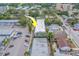 An aerial view of the multi-Gathering property with ample parking and mature landscaping at 1221 Drew St # E12, Clearwater, FL 33755
