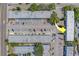 Aerial view of a multifamily property complex with large parking lot at 1221 Drew St # E12, Clearwater, FL 33755
