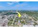 A neighborhood aerial view of the property with a distant view of the water and city skyline at 1221 Drew St # E12, Clearwater, FL 33755