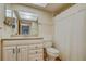 Bathroom featuring a vanity, mirror, and shower with a white curtain at 1221 Drew St # E12, Clearwater, FL 33755