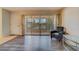 Living room showing glass sliding door to balcony and neutral paint at 1221 Drew St # E12, Clearwater, FL 33755