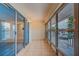 Enclosed sunroom with sliding glass doors providing indoor-outdoor living at 1221 Drew St # E12, Clearwater, FL 33755