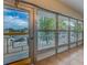 Sunroom showcasing tiled floors and outdoor scenery at 1221 Drew St # E12, Clearwater, FL 33755