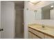 Bathroom featuring a shower, single sink vanity, and good lighting at 1241 S Martin Luther King Jr Ave # 302, Clearwater, FL 33756