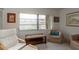 Cozy living room with neutral tones, comfortable seating, and a view of the outdoors at 1241 S Martin Luther King Jr Ave # 302, Clearwater, FL 33756