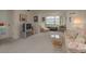 Cozy living room has carpet flooring, neutral paint and furniture at 1241 S Martin Luther King Jr Ave # 302, Clearwater, FL 33756