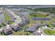 Aerial view of lake community with neighborhood homes and ponds near green space at 12902 Brookside Moss Dr, Riverview, FL 33579