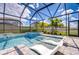 Inviting screened pool with in-pool loungers and a relaxing spa feature at 12902 Brookside Moss Dr, Riverview, FL 33579