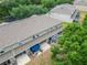 An aerial view of the home showcases the patio and well maintained roof at 15855 Fishhawk View Dr, Lithia, FL 33547