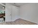 This bedroom showcases a closet and an open door to the home's living space at 15855 Fishhawk View Dr, Lithia, FL 33547