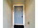Close-up of the front door with visible house number for easy identification at 15855 Fishhawk View Dr, Lithia, FL 33547