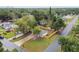 Aerial view of a home with a partially-fenced backyard at 1801 E Navajo Ave, Tampa, FL 33612