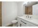 Bathroom featuring a white vanity and modern fixtures at 1801 E Navajo Ave, Tampa, FL 33612