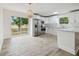 Renovated kitchen featuring stainless steel appliances, quartz counters, and modern fixtures at 1801 E Navajo Ave, Tampa, FL 33612