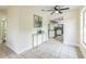 Open layout with a view from the living room to the kitchen at 1818 Kim Acres Ln, Dover, FL 33527